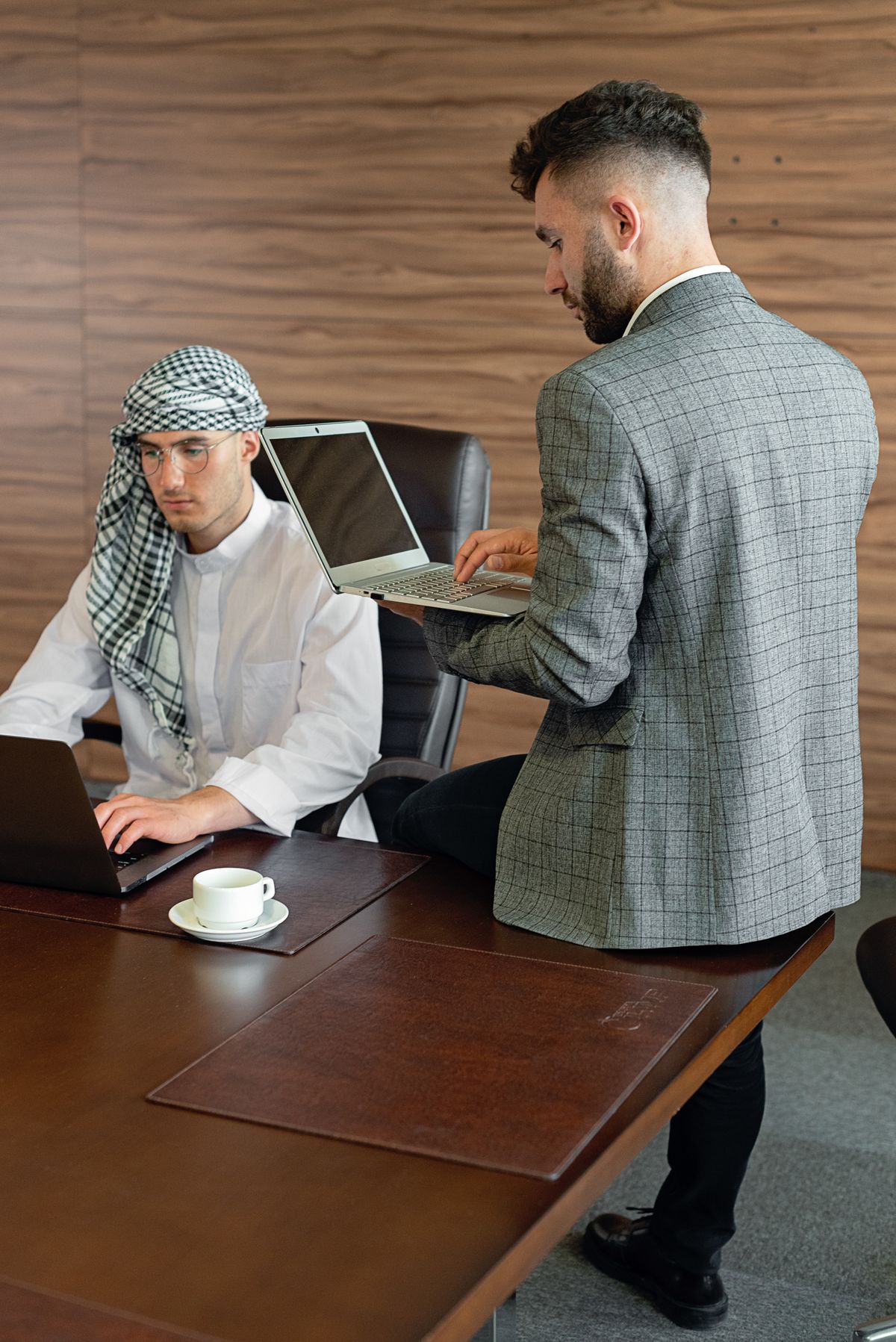 Two professionals working together in an office